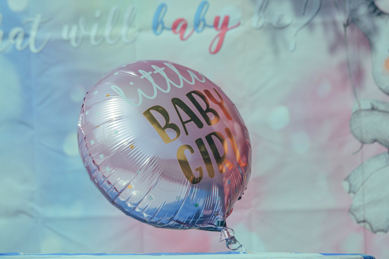 Pink balloon with 'little baby girl' text, perfect for baby showers or gender reveal parties.